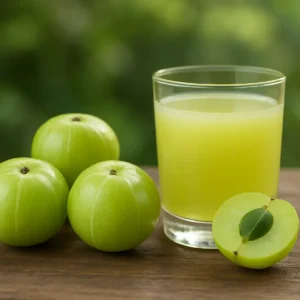 Amla fruits and juice with a natural background. Amla Digestive Health